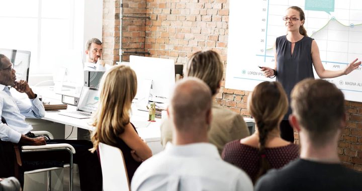 Instructor presenting wirelessly to a classroom projector with CastGo